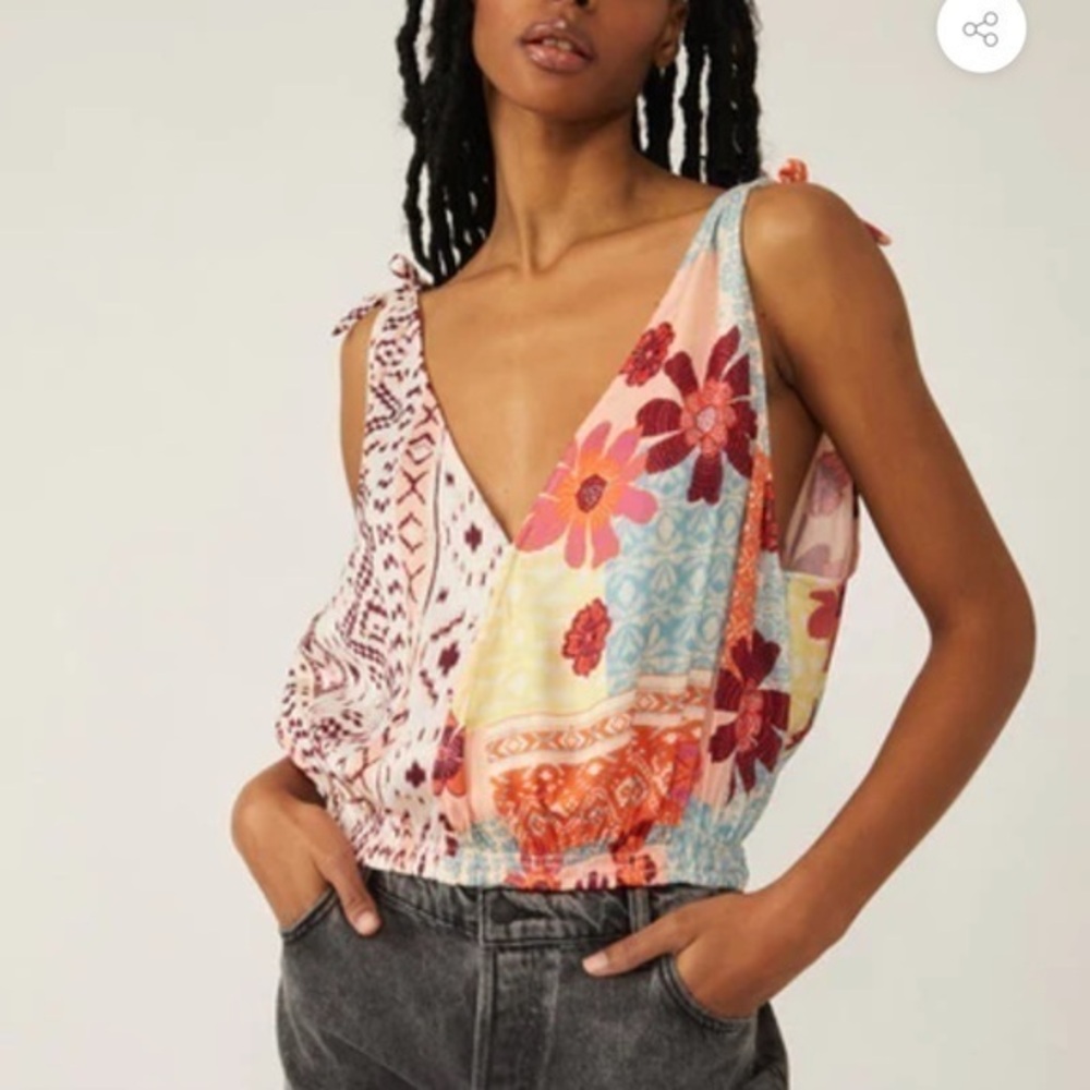 Free people tied to you tank top. Color is tropical combo.
